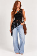 The Lace One-Shoulder Top, front view styled with wide-leg jeans